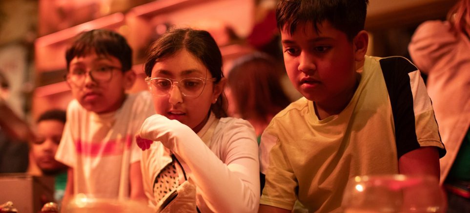 A group of children in an immersive theatre show